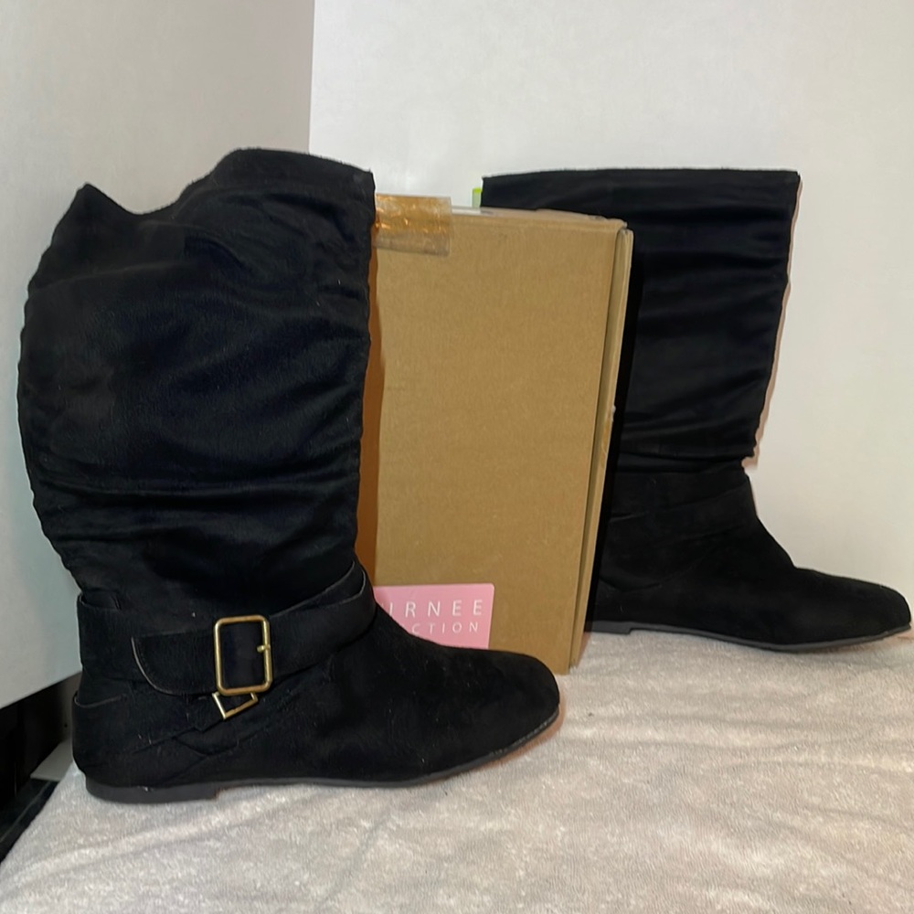Journey Collection Size 10 Women’s black cloth boots with brass colored buckles.
